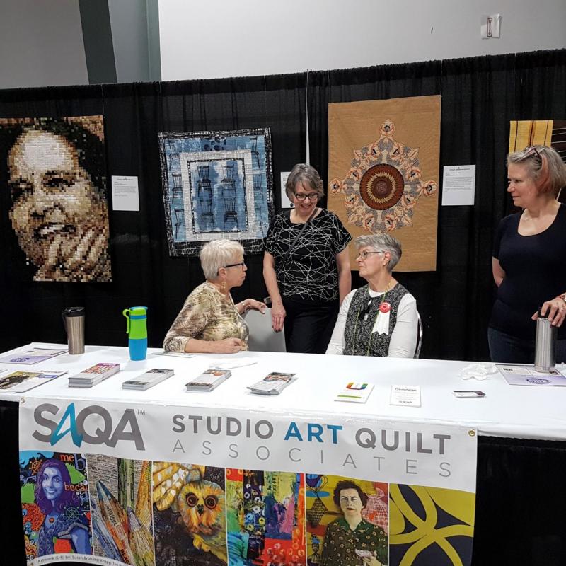 SAQA booth at Quilt Canada in Ottawa in June 2019. Photo by June Robertson