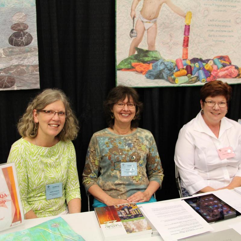 A few of our members staffed a SAQA booth at the Lakeland, Florida Sewing Expo. 