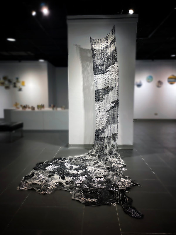 Chiu Ching-Ting, "Binding with Thread," 2022. Wool, fabric scraps, hand-spun yarn; spinning, weaving, Nuno felting; 78.75 x 23.50 x 51.25 in. Photo courtesy of the artist.