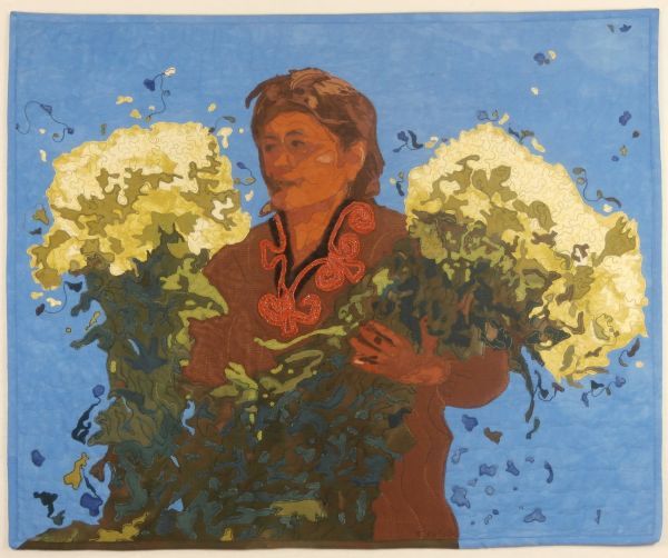 Kathleen McCabe - Woman With Flowers (a quilted portrait of a woman holding large flower bouquets on blue ground)