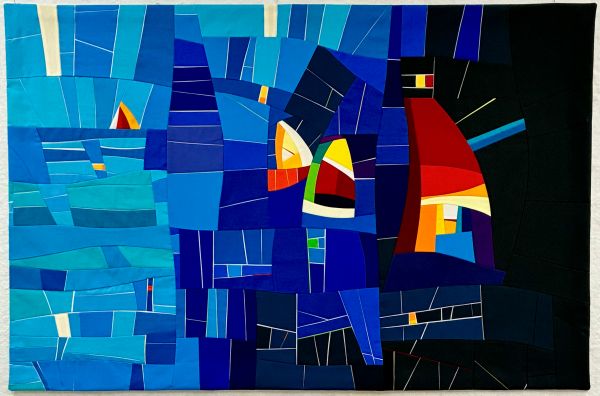 Alexandra Kingswell - Sail me away (a quilt of blue shapes forms water. several bright colored shapes suggest sailboats on the ocean)