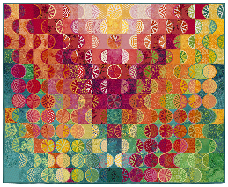 Ann Feitelson - Fruit Cup Runneth Over (a quilt made of colorful fruit slices and squares)
