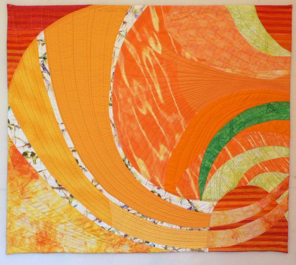 Nancy Bardach - California Dreaming (a quilt with orange swirls)