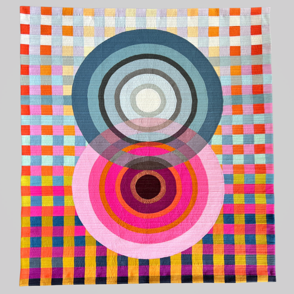  Heather Akerberg - Cold/Simmer (quilt with colorful grid and two overlapping concentric circles)