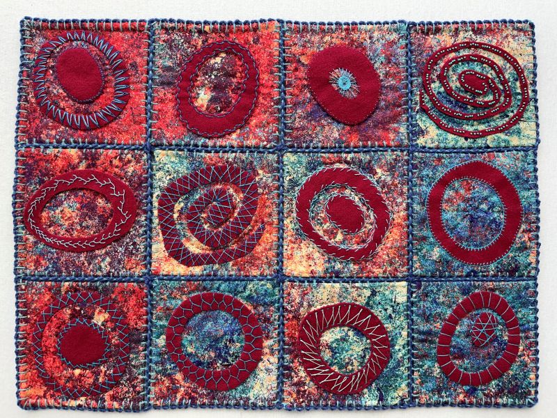 Dianne Miller Wolman - Circular Sampler (a red grid of heavily textured stitched circles and swirls)