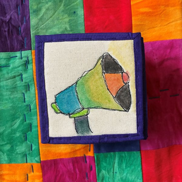 Jaleesa Wells - Making History Noisy (a quilt with colorful rectangles around a painted megaphone)