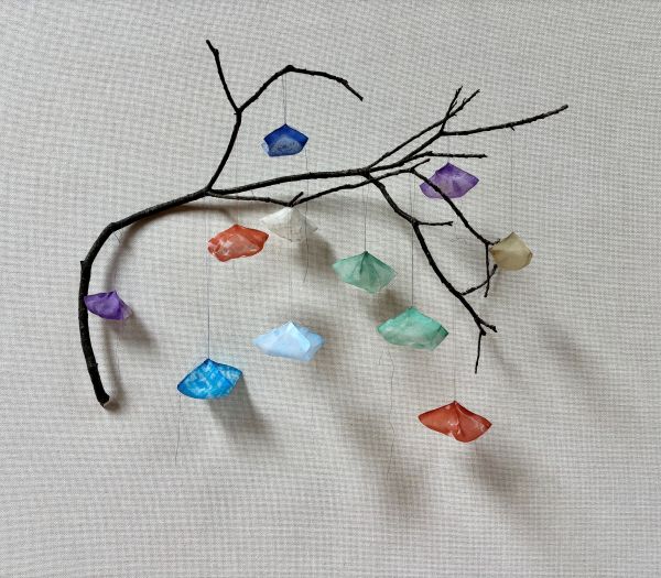 Mirka Knaster - Branching Out, IV (small fabric pouches hanging from a branch)