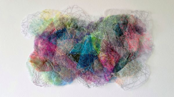 Holly Wong - Lacuna 2 (cloud-like art piece made of colorful translucent fabrics and bright threads)