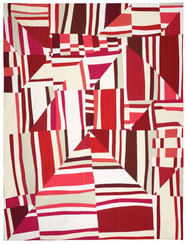 Barbara Danzi - Left Turn (a quilt made of red and cream triangles, rectangles, and stripes)