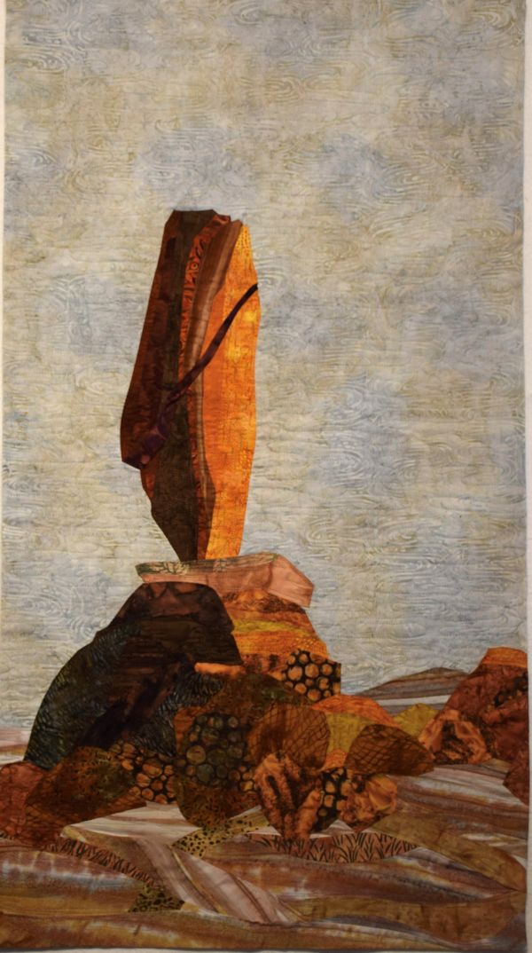  Patricia Joy - Standing Rock (a quilt of standing rock, a large rock that balances vertically. It is made up of many different prints)