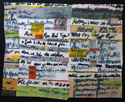 Colleen Ansbaugh - Lost Thoughts ( a quilt made of multicolor strips with thick cursive text)