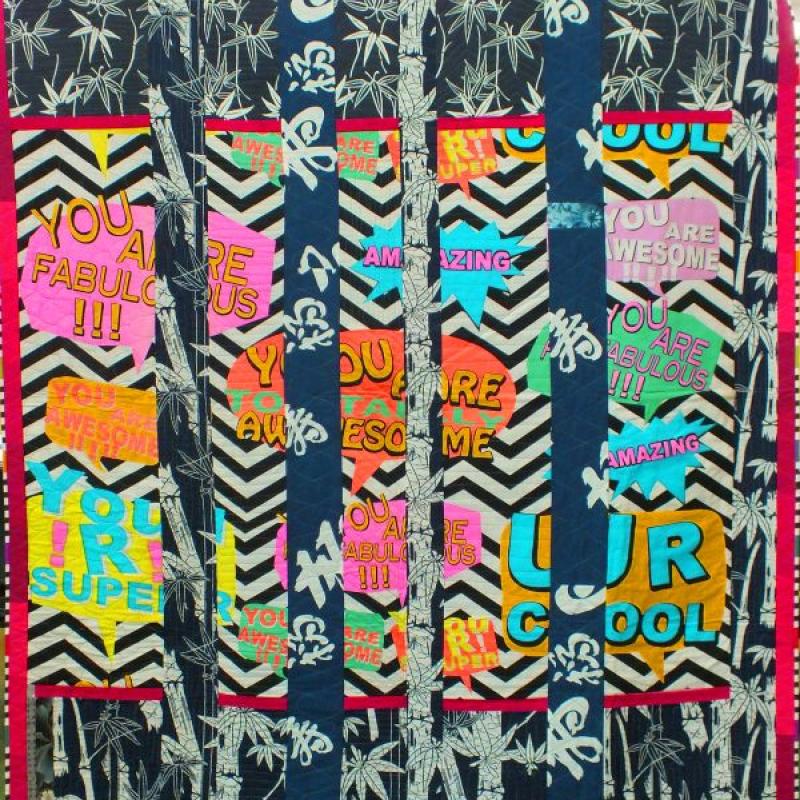 Alan R Tremain - Quiltfitti (quilt with black and white chevron and bamboo print background, with grafitti style text in speech bubbles saying things like "you are fabulous")