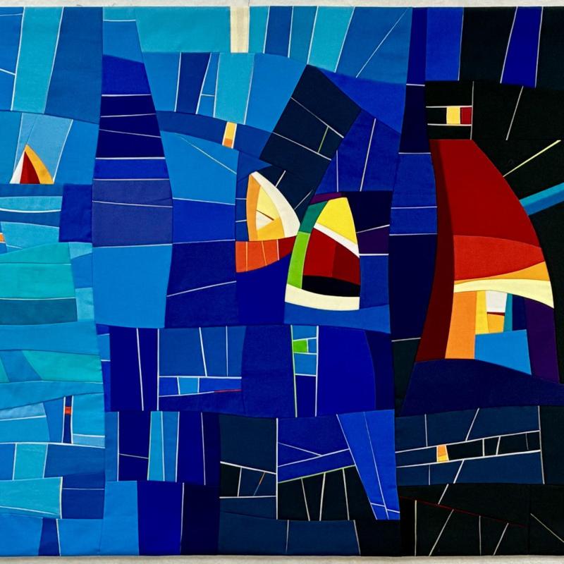 Alexandra Kingswell - Sail me away (a quilt of blue shapes forms water. several bright colored shapes suggest sailboats on the ocean)