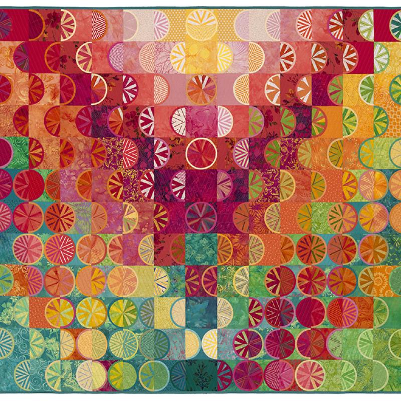 Ann Feitelson - Fruit Cup Runneth Over (a quilt made of colorful fruit slices and squares)