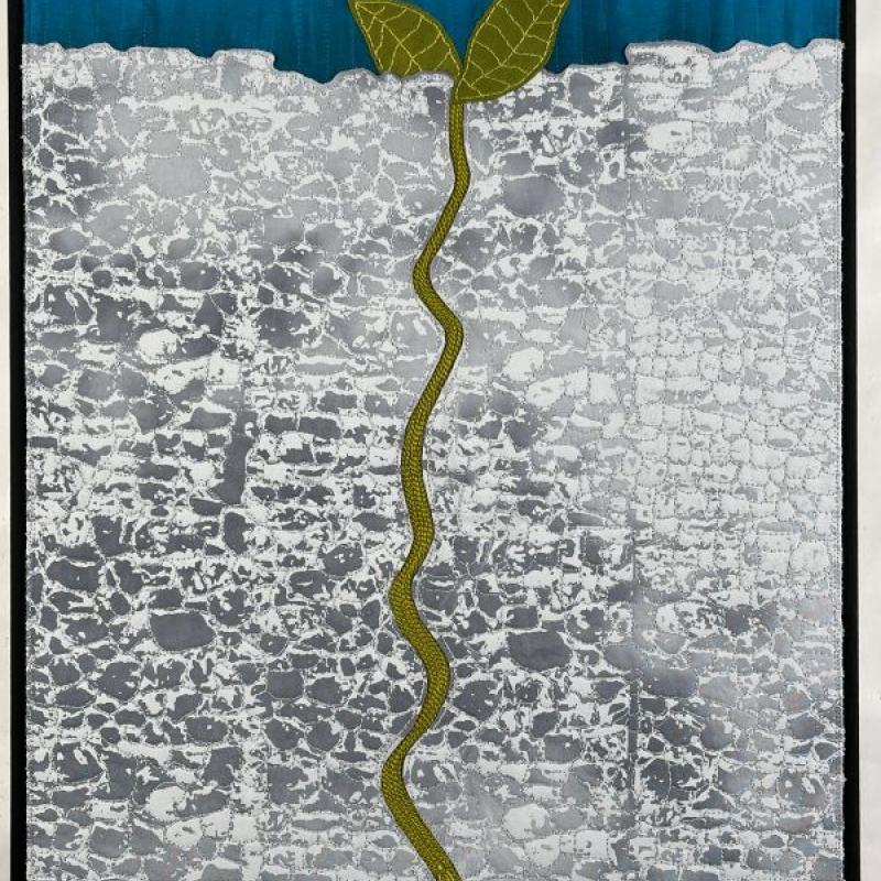 Pat DaRif - Still I Rise (Maya Angelou) (a quilt showing the roots of a plant that is sprouting out of the ground)