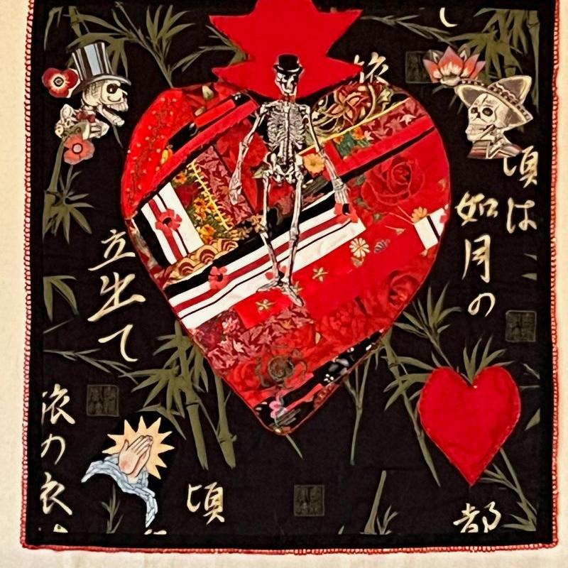 Gaby Litsky - Heart of a Skeleton (skeletons in hats appliqued on a heart and black background)