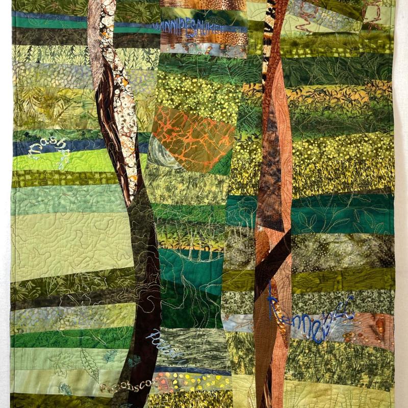 Clover L. Kemp - New Hampshire Driving Impressions (44”Hx29”W) (quilt made of green printed fabric wonky rectangles in background and two tree shapes)