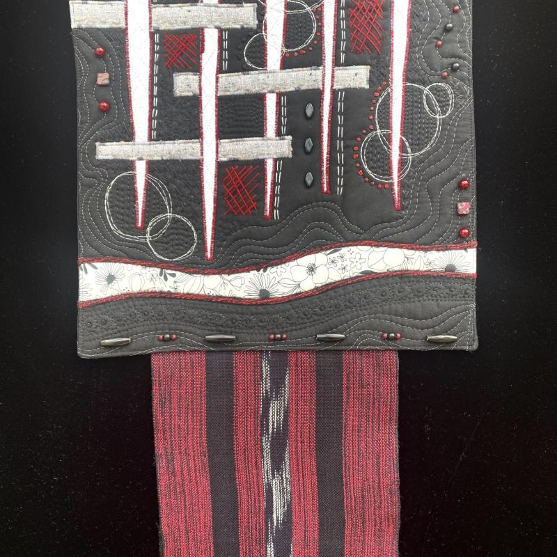 Heidi Zielinski - Sparks In The Dark (black white and red art quilt incorporating weaving remnants)