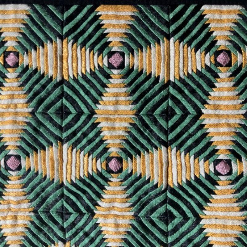 Amy Pabst -  Windmill Blades (a geometric pattern of pieced strips in green yellow black and white)