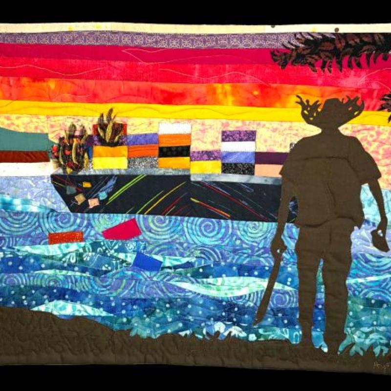 Aynex Mercado - San Juan Tea Party (a quilt showing the silhouette of a man in a Puerto Rican hat on the beach. The sun is setting over the ocean and a boat)