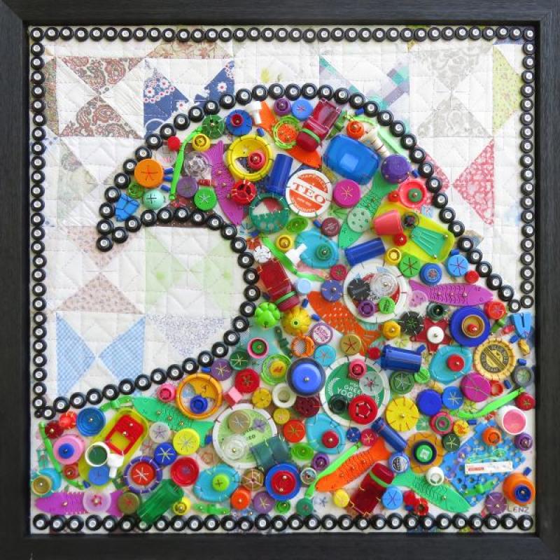 Susan Lenz - Tidal Wave XI (a wave shape made of colorful found items on a vintage quilt)