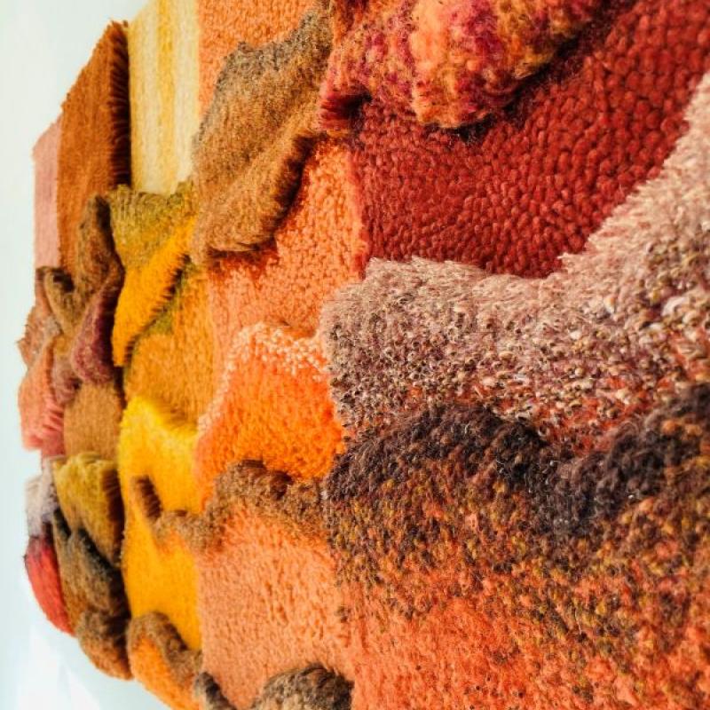 Marisa Wieland - Forgotten Billboards (close up of rug art in oranges and reds)